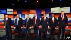 Republican presidential candidates take the stage before their debate at the North Charleston Coliseum in North Charleston, S.C., Jan. 14, 2016.