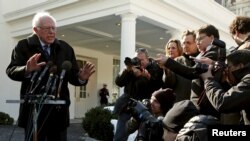 U.S. Democratic presidential candidate Bernie Sanders speaks to reporters at the White House after his meeting with U.S. President Barack Obama in Washington, Jan. 27, 2016.