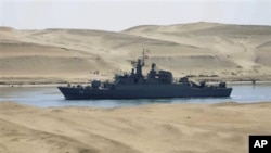 The Iranian navy frigate IS Alvand passes through the Suez canal at Ismailia, Egypt, Tuesday, Feb.22, 2011