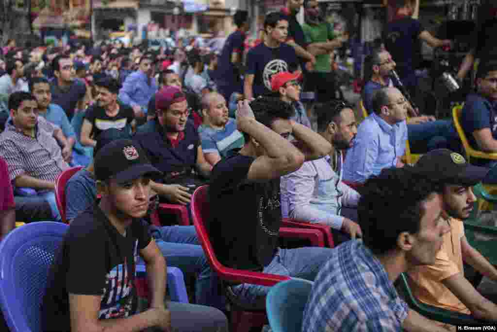 Egyptian football fans gather on a street coffee shop to watch the last match between Egypt and Saudi Arabia, June 25, 2018, during World Cup 2018, in Cairo’s Shubra district.