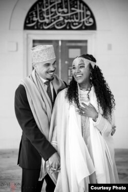 Jeremy Randall and Ariam Mohamed celebrate their April 22 engagement at the Diyanet Center of America, a moque in Lanham, Md. (Photo courtesy of Ariam Mohamed)