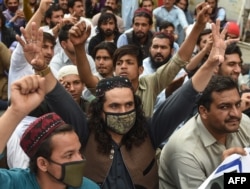 Activists of Pashtun Protection Movement (PTM) protest against the arrest of their activists and leaders, in Karachi on Feb. 10, 2019.