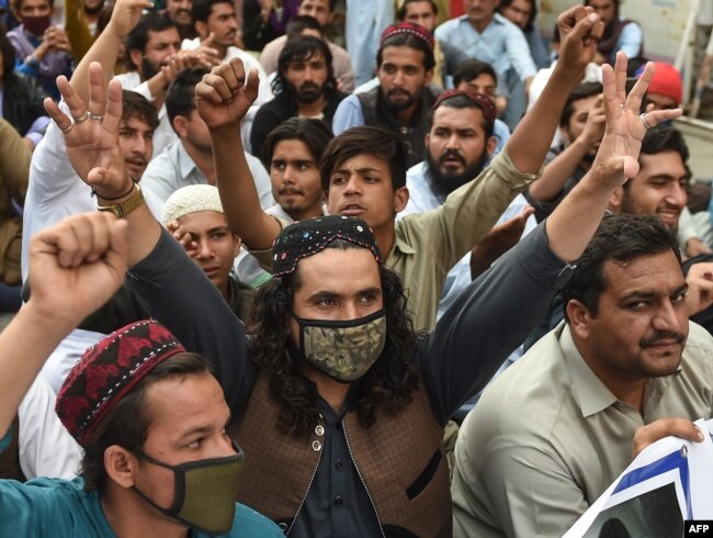 Activists of Pashtun Protection Movement (PTM) protest against the arrest of their activists and leaders, in Karachi on Feb. 10, 2019.