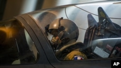 French Army photo shows a French fighter pilot preparing to take off at Kossei camp in Chad, Jan. 11, 2013.
