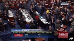 This frame grab from video provided by C-SPAN2, shows the floor of the Senate on Capitol Hill in Washington, Sept. 28, 2016, as the Senate acted decisively to override President Barack Obama's veto of Sept. 11 legislation.