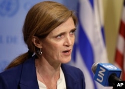 FILE - Samantha Power, U.S. ambassador to the U.N., talks to reporters during a break in Security Council consultations. Power said the resolution 'would break new ground and represent the strongest set of sanctions imposed by the Security Council in more than two decades.'