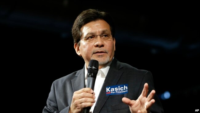 Former U.S. Attorney General Alberto Gonzales introduces Republican presidential candidate Ohio Gov. John Kasich at a rally, Feb. 27, 2016, in Nashville, Tennessee.