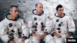 Apollo 10 astronauts Eugene Cernan, Lunar Module Pilot, Thomas Stafford, Commander and John Young, Command Module Pilot are seen in this NASA photograph.