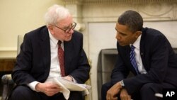 Obama milyarder yatarımcı Warren Buffett ile