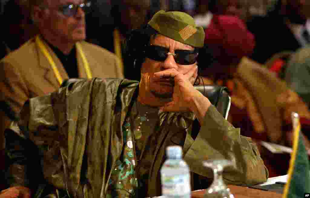 Libyan leader Muammar Gadhafi attends the opening of the African Union summit at the Commonwealth Resort in Munyonyo, near Uganda's capital Kampala, July 25, 2010. ( Reuters)