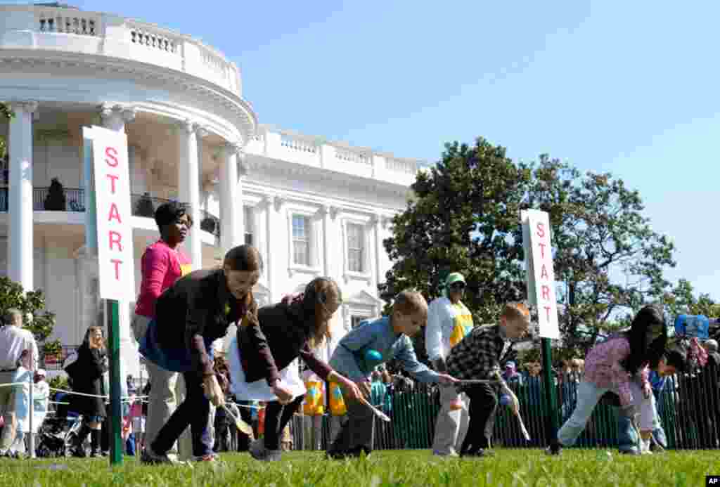 Children participate in the Easter Egg Roll. (AP)