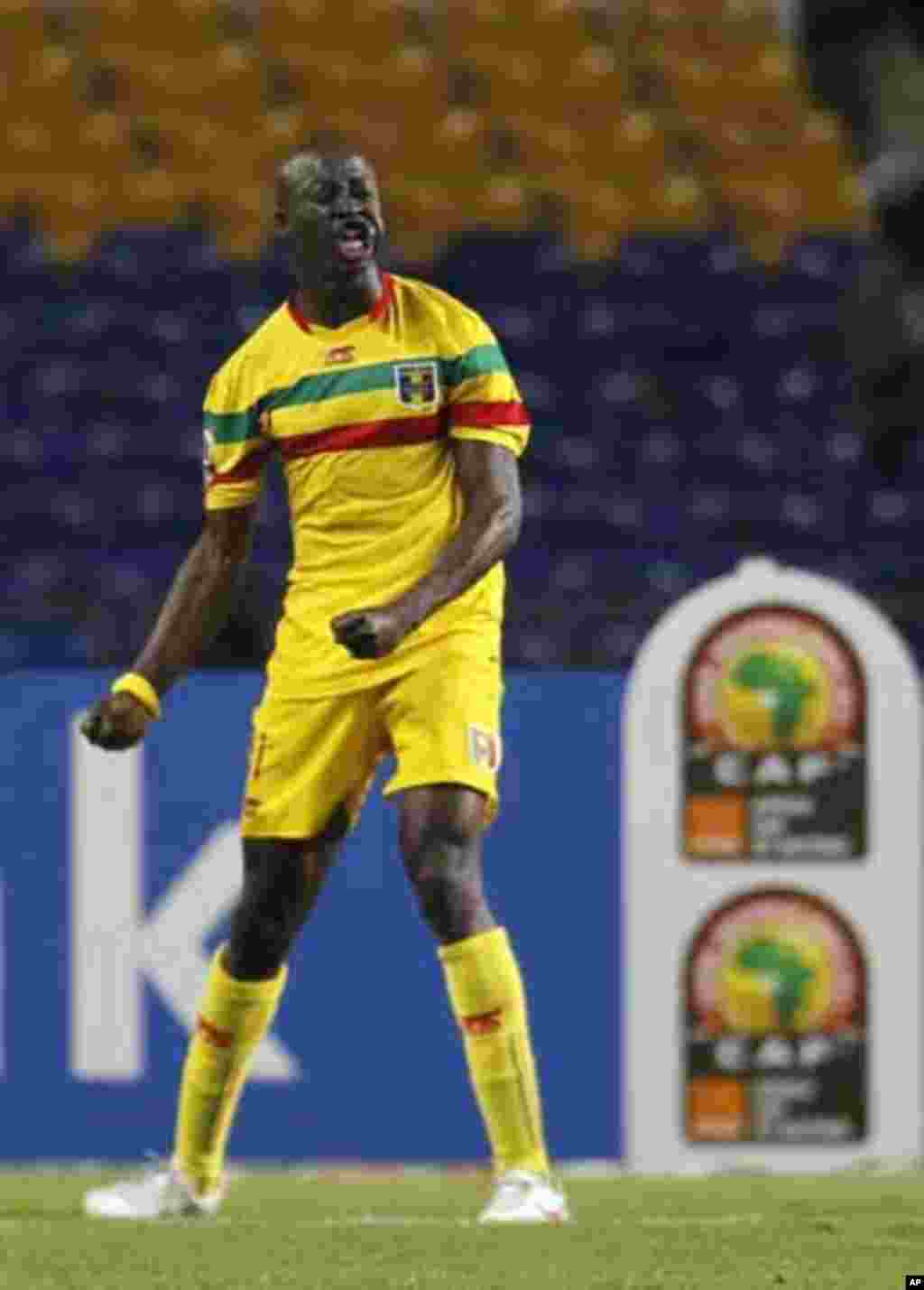 Mali's Garra Dembele celebrates his goal against Botswana during their final African Cup of Nations Group D soccer match at the Stade De L'Amitie Stadium in Libreville February 1, 2012.