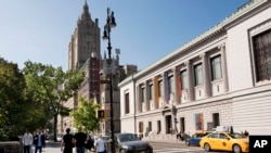 FILE - The New-York Historical Society, at right, is next to an entrance to the city's Central Park. Image taken 10.6.2016