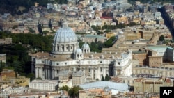 FILE - An aerial view of the Vatican with St. Peter's Basilica is seen in this undated photo. 