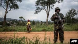 Une patrouille de la Monusco pour traquer les rebelles ougandais des Forces Démocratiques Alliés (ADF), le 13 novembre 2018. (Photo by John WESSELS / AFP)