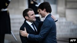 Emmanuel Macron, à gauche, et Justin Trudeau à l'Elysée, Paris, le 16 avril 2018.