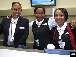 Employees working behind the American Airlines counter were surprised to arrive at 4:00 am to find hundreds already lined up to check in, 19 Feb. 2010