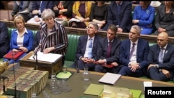 Britain's Prime Minister Theresa May makes a statement in the House of Commons, London, Britain, Nov. 26, 2018.