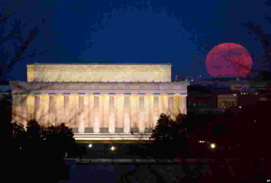 March 19: The full moon is seen as it rises near the Lincoln Memorial, in Washington, D.C. The full moon was called a "Super Perigee Moon" -- The last full moon so big and close to Earth occurred in March of 1993. (NASA - Bill Ingalls)