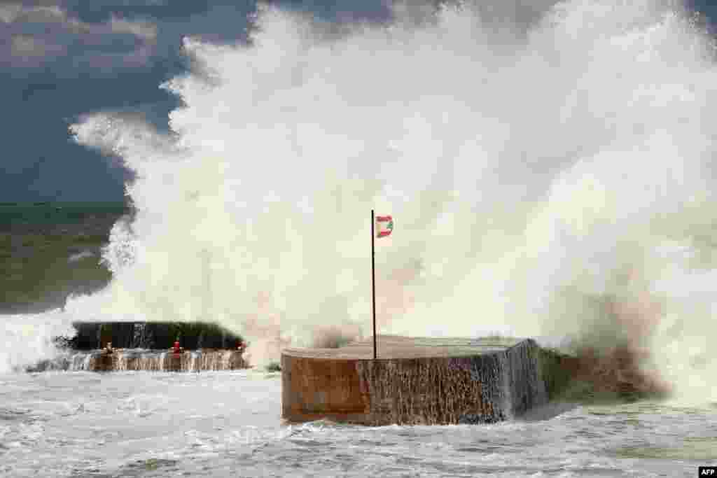 Waves crash on the shoreline of the al-Manara promenade in Lebanon&#39;s capital city Beirut.