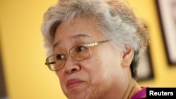 FILE - Myunghee Bae, the mother of Kenneth Bae, is pictured during an interview with Reuters in Lynnwood, Washington, Aug. 7, 2013. 