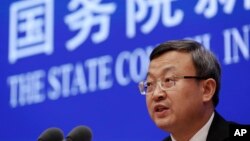 中国商务部副部长王受文在记者会上介绍《关于中美经贸磋商的中方立场》白皮书。（2019年6月2日）