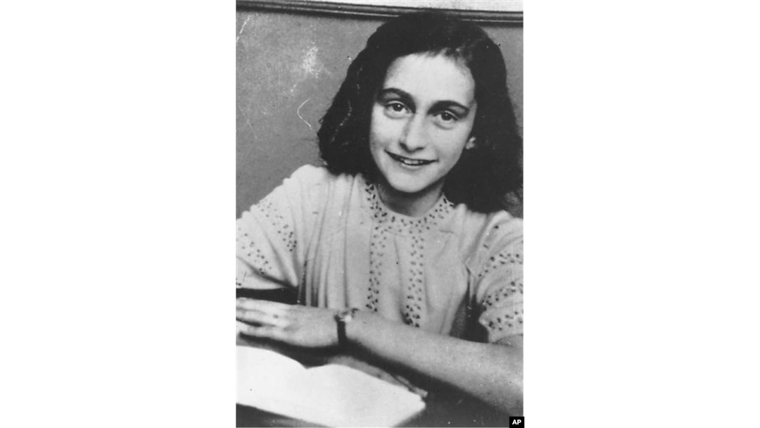 FILE - This is an undated photo of Anne Frank from the Anne Frank Center, USA. (AP Photo/Anne Frank Center)