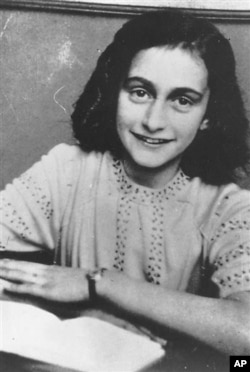 FILE - This is an undated photo of Anne Frank from the Anne Frank Center, USA. (AP Photo/Anne Frank Center)