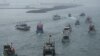 FILE - Several dozen fishing boats flying Taiwanese national flags set out from the Suao harbor, northeastern Taiwan, Sept. 24, 2012.