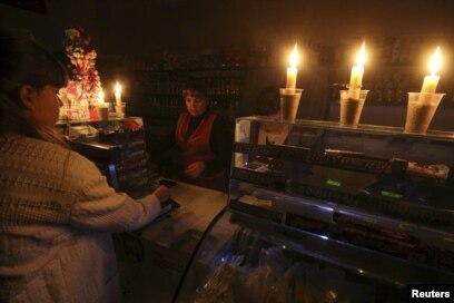 During Ukraine's rolling blackouts, candles and 'faith in ourselves' become  latest weapons
