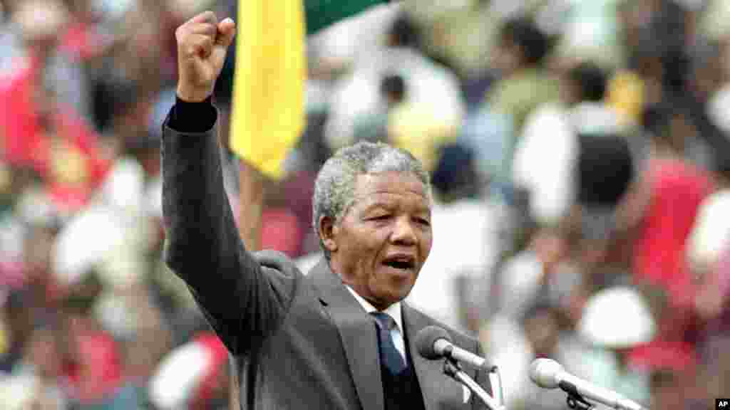 ANC leader and symbol of resistance to apartheid, Nelson Mandela, is seen as he gives the black power salute to the 120,000 ANC supporters in&nbsp; Soweto&#39;s Soccer City stadium in Soweto, near Johannesburg, South Africa, Feb. 13, 1990.