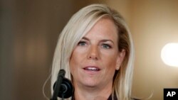 FILE - Kirstjen Nielsen, President Donald Trump's nominee to be Secretary of Homeland Security, speaks during an event in the East Room of the White House.