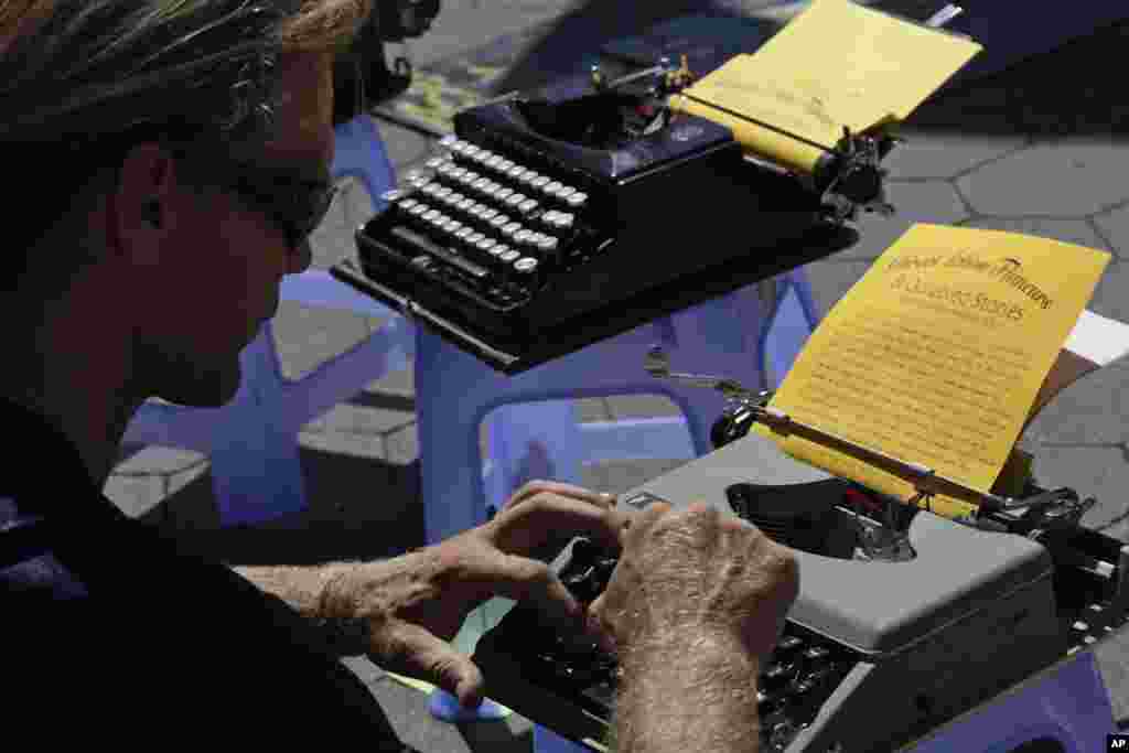 Barry Knight, an activist associated with the Occupy DC movement, uses an old fashion typewriter to tell his story during a gathering of the Occupy Wall Street movement in Washington Square park, New York, September 15, 2012.