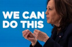 US Vice President Kamala Harris meets virtually with the founding members of the Covid-19 Community Corps in the South Court Auditorium of the White House in Washington, DC, on April 1, 2021.