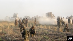 Pasukan Kurdi dalam operasi militer untuk merebut beberapa desa dari tangan ISIS di kota Kirkuk, Irak. 