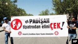 Protestors carry banner that reads "O Sultan, take your hands off theaters," May Day rally, Ankara, Turkey, May 1, 2012.