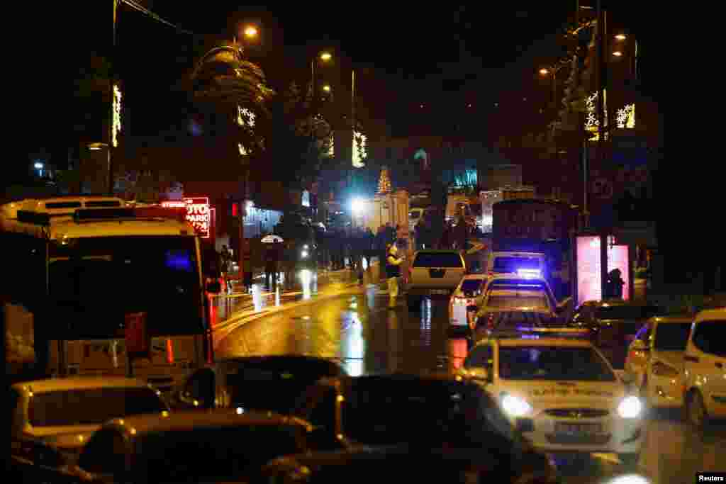 Police forensic experts examine an area near an Istanbul nightclub, following a gun attack, Jan. 1, 2017.