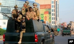 Security forces patrol in Basra, Iraq, 340 miles (550 kilometers) southeast of Baghdad, Sept. 8, 2018.