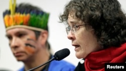 President of the National Indian Foundation (FUNAI), Marta Maria do Amaral Azevedo (R), participates in a debate about the situation of indigenous people and issues that affect these communities, in Brasilia, April 18, 2013. 