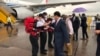 资料照片: 2020年5月12日中国驻刚果(金)大使朱京迎接抵达刚果的中国专家