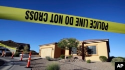 Police tape blocks off the home of Stephen Craig Paddock on Oct. 2, 2017, in Mesquite, Nev.