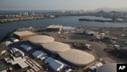 File - The Olympic Park of the 2016 Olympics is seen from the air, in Rio de Janeiro, Brazil, July 4, 2016. The International Olympic Committee said on Sunday, July 9 2017, that it has declined to step in and help Rio Olympic organizers with a debt estima