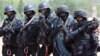 FILE - Indian soldiers of OCTOPUS, or Organization for Counter Terrorist Operations, participate in a parade in Hyderabad, India, June 2, 2015.