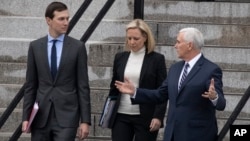 White House senior adviser Jared Kushner, Homeland Security Secretary Kirstjen Nielsen and Vice President Mike Pence talk as they walk down the steps of the Eisenhower Executive Office Building on the White House complex, Jan. 5, 2019, in Washington.