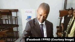 Emmanuel Ramazani Shadary, candidat de la coalition au pouvoir, vote à Gombe, Kinshasa, RDC, 30 décembre 2018. (Facebook/PPRD)