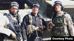The crew of "Paytakht-5" comedy show is seen in Islamic State uniforms. 