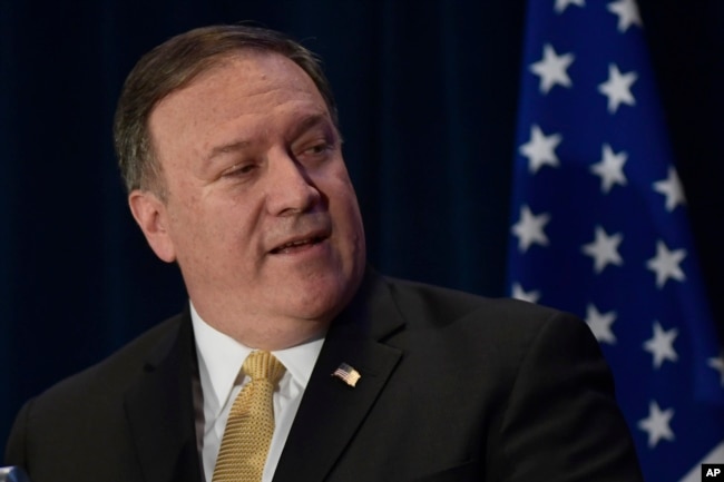 U.S. Secretary of State Mike Pompeo speaks during a press briefing, June 11, 2018 in Singapore one day before President Donald Trump will meet with North Korean leader Kim Jong Un.