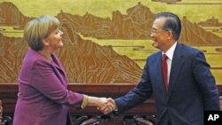 德國總理默克爾和中國總理溫家寶星期四在北京會晤