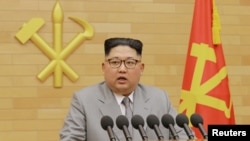 FILE PHOTO: North Korea's leader Kim Jong Un speaks during a New Year's Day speech in this photo released by North Korea's Korean Central News Agency (KCNA) in Pyongyang on January 1, 2018.