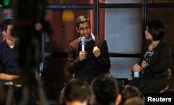 FILE - Google CEO Sundar Pichai gestures as he addresses conference with local IT community, Hanoi, Vietnam, Dec. 22, 2015.